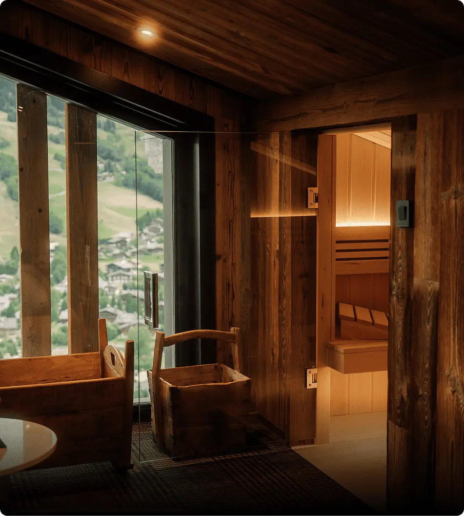 Sauna intérieur intégré dans un chalet à Megève, avec vue sur la vallée